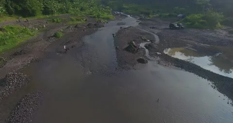 Kalikuning river under merapi mountain in yogyakarta Stock Footage 237095457