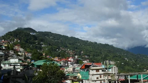 Kalimpong town with floating clouds over the mountain slope. Stock Footage 155576254