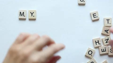 Kaliningrad 2021. 22.07.2021. hands composing words my class from wooden letters Video stock 157814859