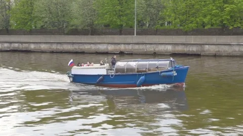 Kaliningrad - May 2017 Russian  Sightseeing boat with tourists swims along .. Stock Footage 75407265