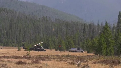 Kaman helicopter shutting down next to work truck Stock Footage 140295663