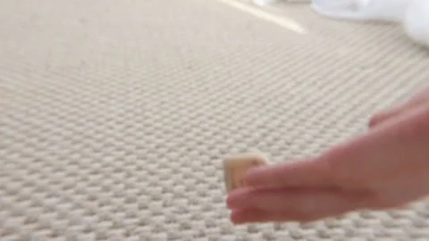 Kamasutra dice throw on the carpet slowmo Stock Footage 129739100