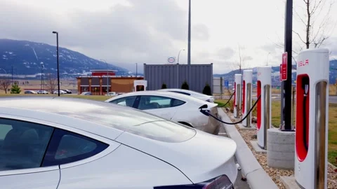 Kamloop, Canada, Dec 2020: Branded charging station for electric vehicles Tesla Stock Footage 145550441