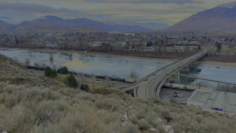 Kamloops Overlander bridge looking north over river, 4k Stock Footage 230196719