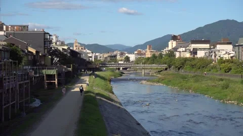 Kamo River and Mountains in Background in Kyoto, Japan Stock Footage 267424934