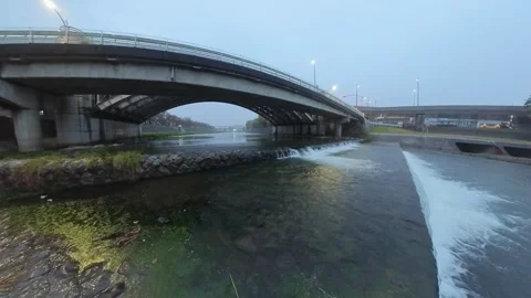 Kamo River (kamogawa) on a rainy day in Kyoto, Japan. Stock Footage 255126341