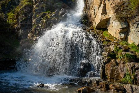 Kamysh waterfall at sunset light, spring time in the Altai Republic, Siberia Stock Photos