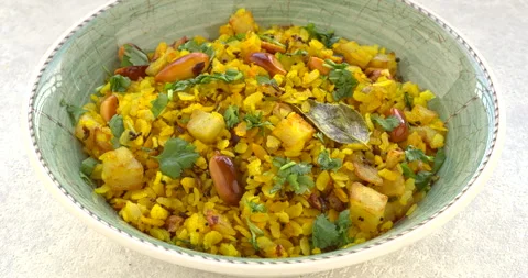 Kanda poha or Batata Poha - Indian breakfast meal. Stock Footage 296905715