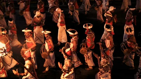 Kandy, Sri Lanka - 07.7.2016: Drummers and dancers during Buddhist ceremony Stock Footage 102953367