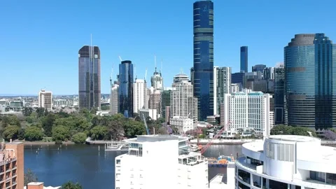 Kangaroo Point, Brisbane CBD, Queensland: Footage of Skyline, River, Jacarandas Stock Footage 305200197