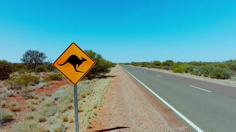 Kangaroo warning sign at Australia Outback Stuart Highway road Vídeos de archivo 267958095