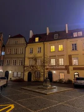 Kanonia, a small triangular square in Warsaws Old Town with Wishing Bell Stock Photos