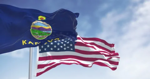 Kansas state flag and US national flag waving outdoors Stock Footage 307924670