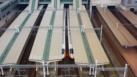 Kaohsiung Station with train passing Stock Footage 105391586