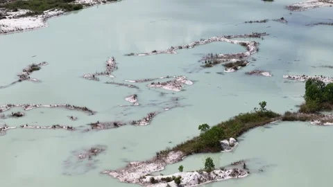 Kaolin Lake is an artificial lake formed from a former kaolin mining area. .. Stock Footage 340640468