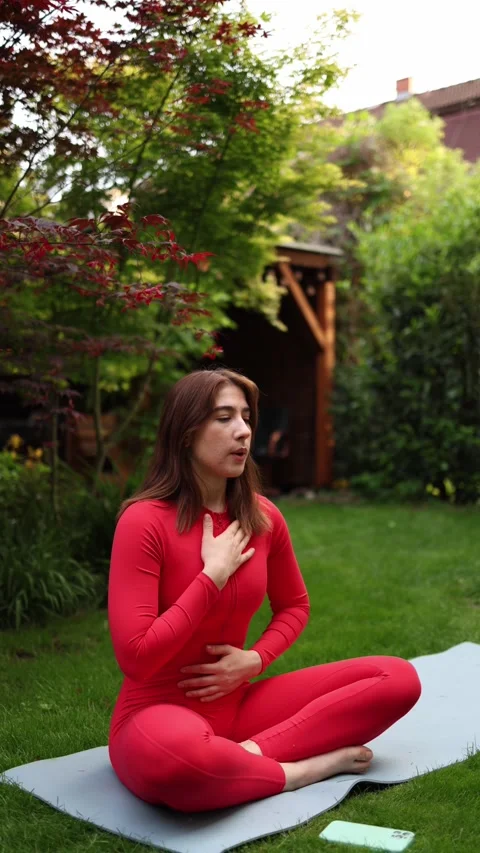Kapalabhati breathwork in garden Stock-Footage 336780839