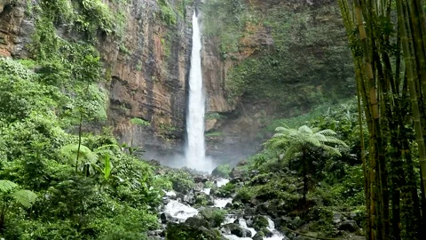 Kapas Biru Waterfall is a hidden paradise in Lumajang, East Java with a height Stock Footage 170989720