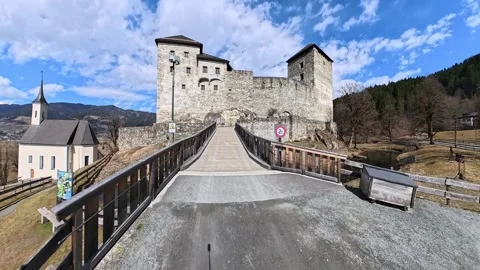 Kaprun, Austria - March 19, 2026: Medieval Castle and Alpine Landscape Stock Footage 345388061