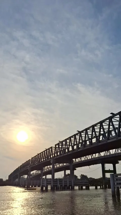 Kapuas 2 Bridge when the sun rises from the eastern horizon Stock Footage 310952816
