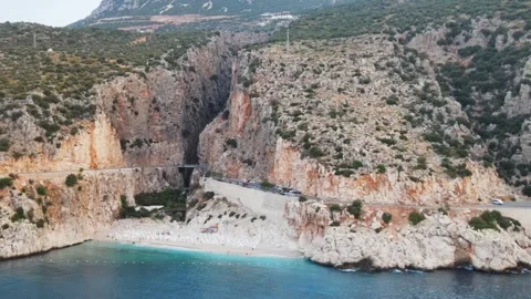 Kaputas Beach aerial pan view of gorge and coast Stock Footage 344534776