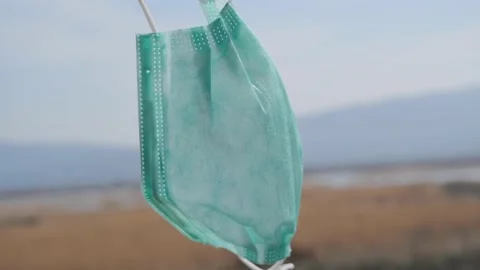 Karacabey floodplain and it is waving of medical mask from the wind. Stock Footage 152914101