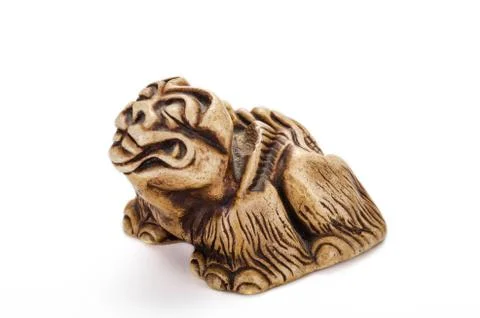 Karashishi fo netsuke on the left side Stockfoto's