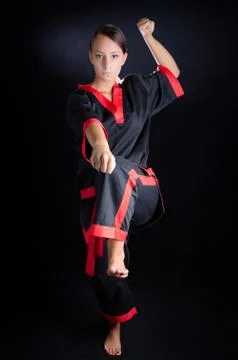 Karate girl in kimono Stock Photos