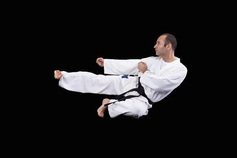 Karate man with back background Stock Photos
