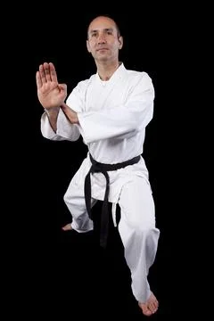 Karate man with back background Stock Photos