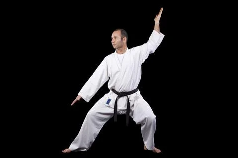 Karate man with back background Stock Photos