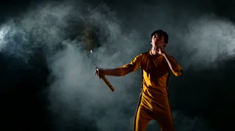 Karate man. exercise with nunchaku, from the young karate 스톡 동영상 50463786