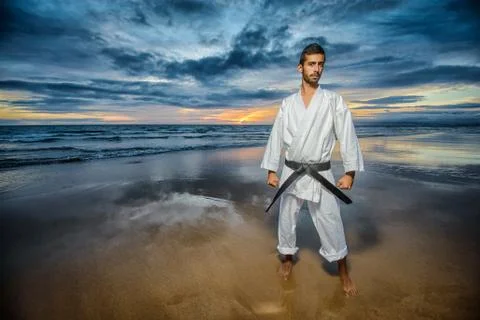 Karate master with dramatic sky Stock Photos