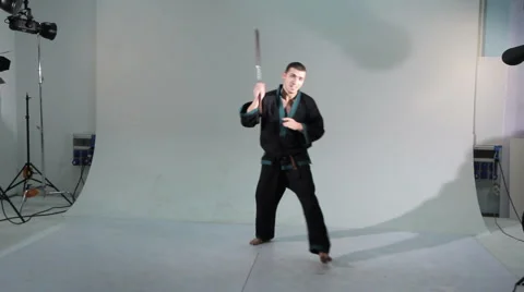 Karate master with nunchaku (2) Stock Footage 947958