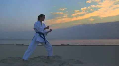 Karate on sunset beach Видео 11042973