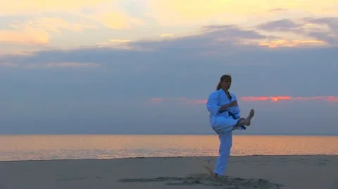 Karate on sunset beach 스톡 동영상 11855846