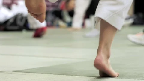 Karate support on warm up 2 Stock Footage 302978656