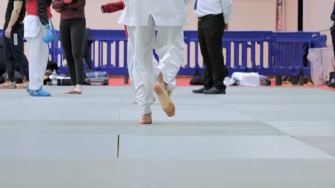 Karate support on warm up Stock Footage 302978665