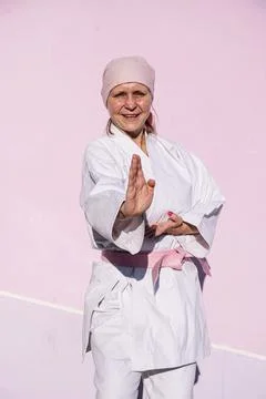 Karate woman who has defeated cancer Stock Photos