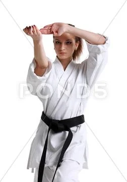 Karate. young girl in a kimono Stock Photos