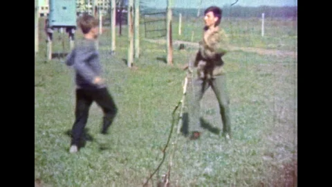 Karateka man fighter defending an attack victim. Staged cruelty outdoor Stock Footage 275051978