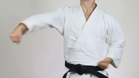 Karateka trains punches Stock Footage 73759961