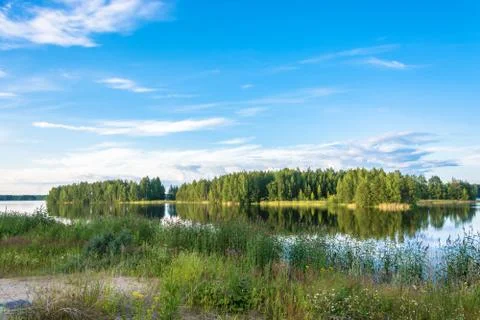 Karelian landscape in the rays of the setting sun. Stock Photos
