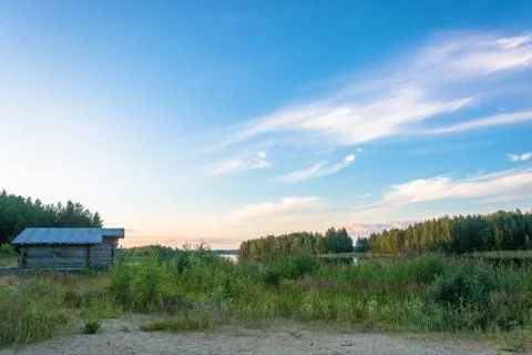 Karelian landscape in the rays of the setting sun. Stock Photos