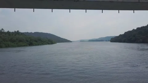 Karli River bridge and backwaters in Devbag, Malvan, Maharashtra, India Stock Footage 333190216