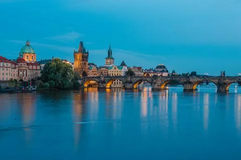 Karlův most - Charles Bridge (Arch bridge) in Prague, at dusk Stock Photos