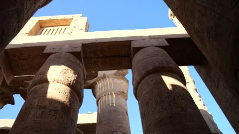 Karnak's Great Columns: Exploring Ancient Grandeur - Luxor, Egypt - 4K Stock Footage 255724861