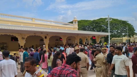 Karnataka- 06 Oct, 2024: Crowd in Mysore Palace Courtyard with Police Presence Stock Footage 304034177
