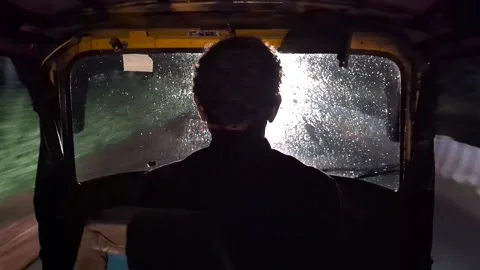 Karnataka, India : 4 October 2024 - Auto Rickshaw Ride in Monsoon Rain Stock Footage 303561059