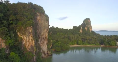 Karst Limestone Cliffs on Railay East Beach, Krabi, Thailand, Ascending Drone Stock-Footage 78341284