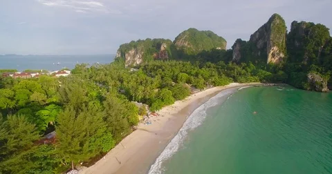 Karst Limestone Cliffs on Railay West Beach, Krabi, Thailand, Descending Aerial Video stock 79000078